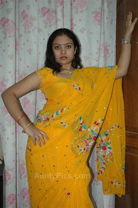 Mehandi Designs World Beautiful Desi In Hot Yellow Saree