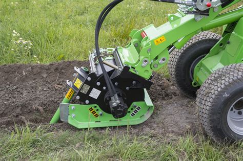 trencher attachment  avant compact articulated mini loader