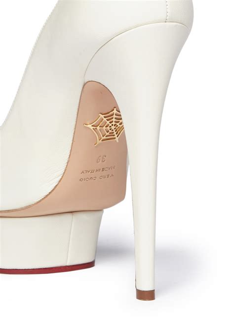 lyst charlotte olympia mistress dolly platform pumps in white