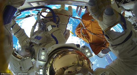 russian cosmonauts break record for longest space walk daily mail online