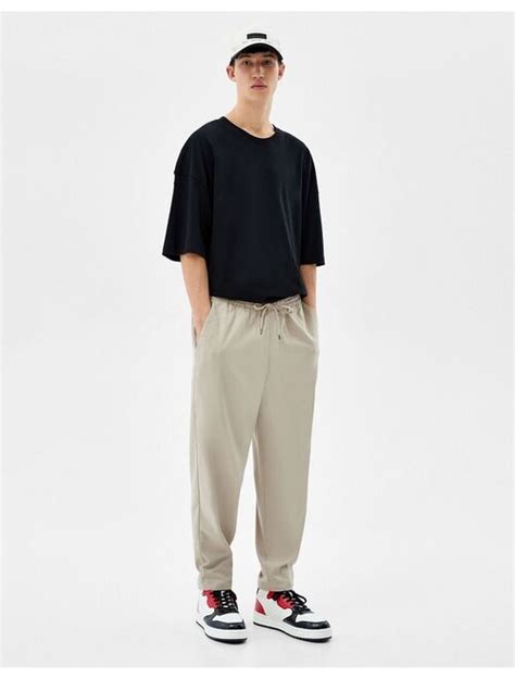 buy bershka loose fit pants  ecru  topofstyle