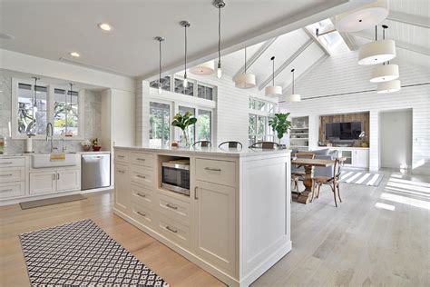 graceful open floor plan home renovations farmhouse kitchen austin home insurance apron sink