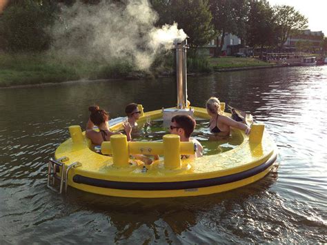 The Hottug A Motorized Floating Wood Fired Hot Tub