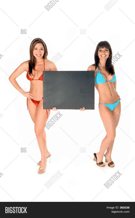 hot bikini girls holding sign board image and photo bigstock
