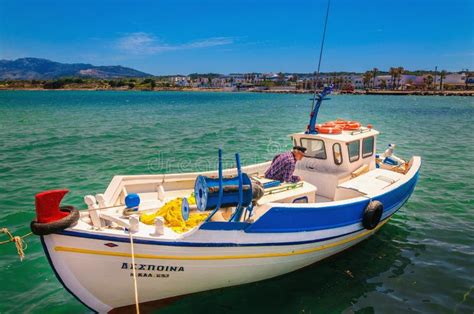 traditional fishing greek boat  fisherman editorial photo image  beach boat