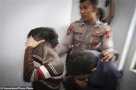 shariah court in indonesia sentences gay couple to caning daily mail online