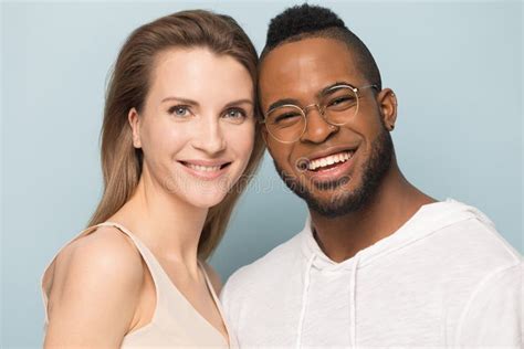 Portrait Of Happy Multiracial Couple Posing For Picture Together Stock