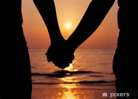 Wall Mural Silhouettes Couples Holding Hands On Sunset Pixers Au