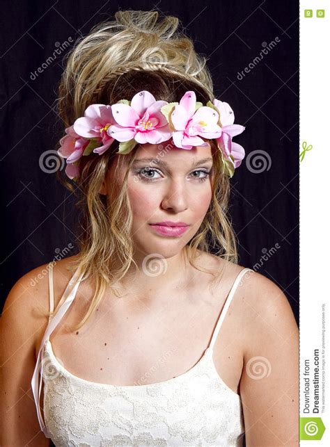 dreamy teen blonde girl party dress flowers stock