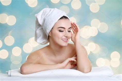 young spa woman touching  face  beauty treatment stock photo