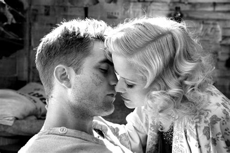 black and white versions of the new water for elephants stills featuring robert pattinson and reese