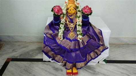 goddess devi draping  saree varalakshmi ammavari saree alankarana