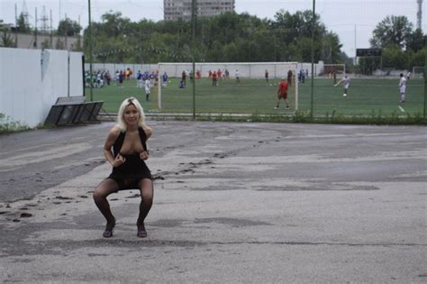 sexiest russian blonde flashes boobs and pussy near soccer field russian sexy girls