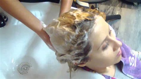 woman having a shampoo in hair salon youtube