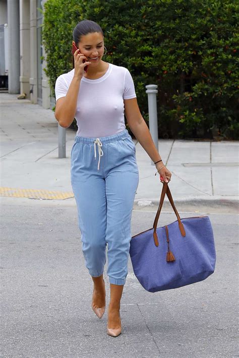 Tao Wickrath Wears White Top And Blue Capri Pants As She