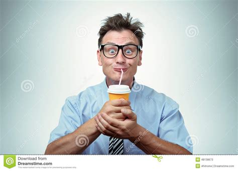Funny Man Drinking From A Paper Cup With A Straw Stock