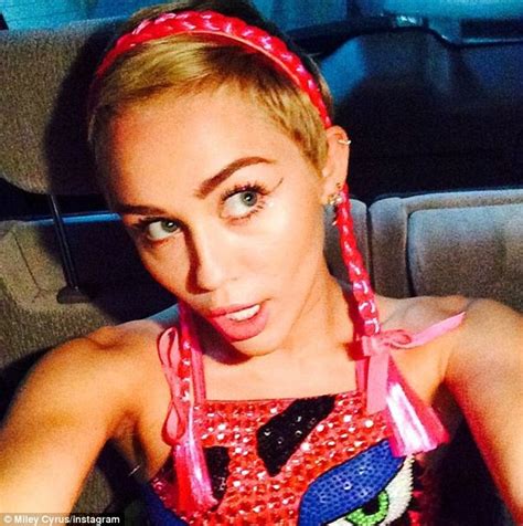 Miley Cyrus Takes To Stage For Sunrise Wearing Lips Leotard In Sydney