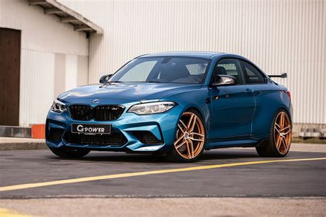 bhp takes  power bmw  competition  mph evo