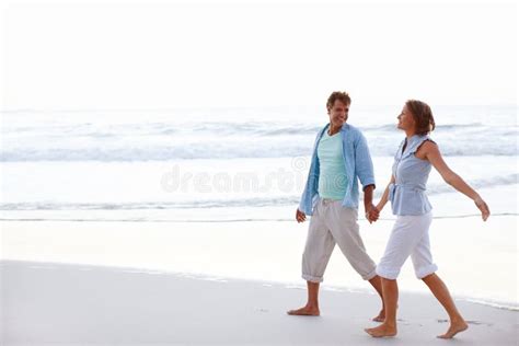 Walking Through Life Together True Love A Happy Couple Walking Hand