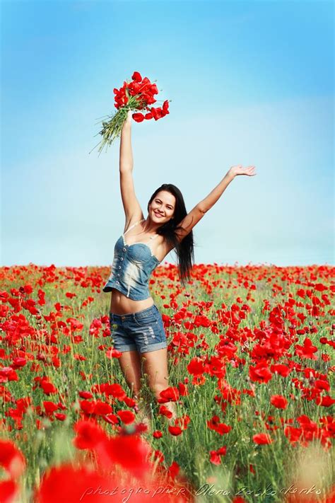 Girl In Poppies Field Beautiful Brunette Woman Jumping In Poppy Field