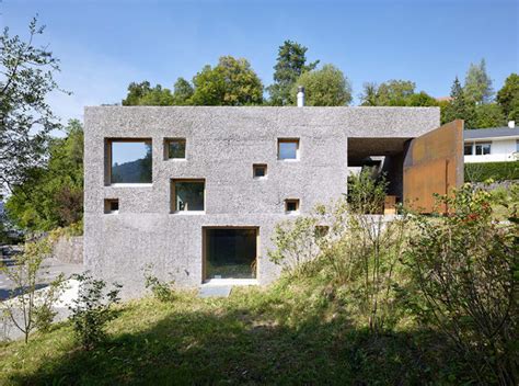 modern concrete house puntured  square windows digsdigs
