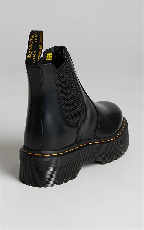 dr martens  quad chelsea boots  black polished smooth showpo