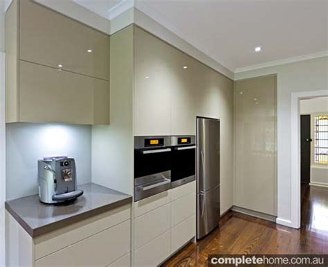 simple sleek  streamlined designer kitchen completehome
