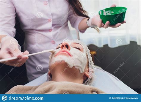 beautiful woman   facial cosmetic scrub treatment