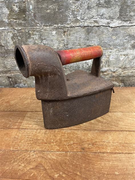 antique sad iron coal iron  chimney  wooden handle etsy