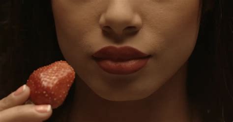 Sexy Woman Eating Strawberry In Slowmotion Sensual Red