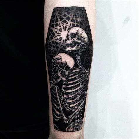double skeleton on coffin tattoo