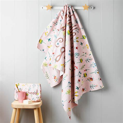 childrens personalised floral swimming towel  tilliemint notonthehighstreetcom