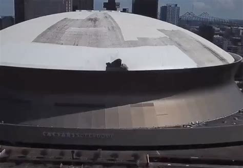 drone footage shows damage  roof  superdome  fire