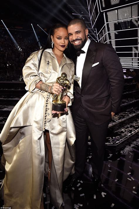 Drake Leans In To Kiss Rihanna As He Presents Her With