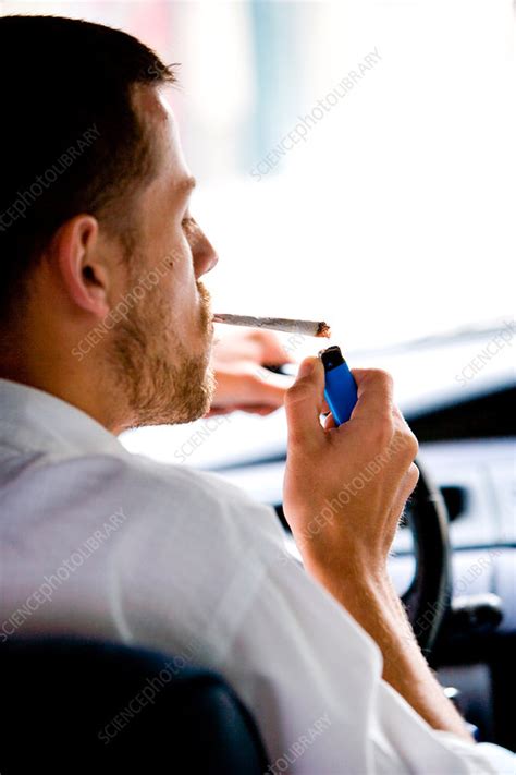 Man Smoking A Joint Stock Image C031 2133 Science Photo Library