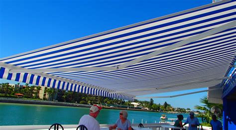shark tales restaurant   outdoor elite retractable awning awning works