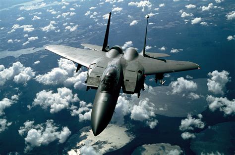 jet fighter flying   clouds image  stock photo public