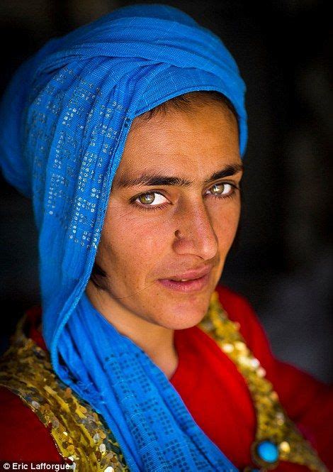 pale eyed portraits of kurdistan offer insight into lives of refugees