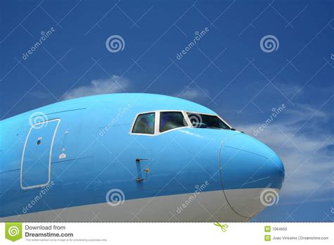 blue airplane stock photo image  busy cabin exit
