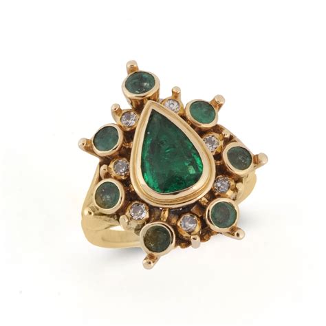 rene boivin an emerald and diamond hindou ring of stylised indian
