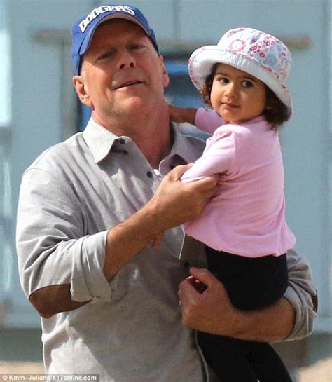 bruce willis plays on the beach with daughter mabel and pregnant wife bruce willis