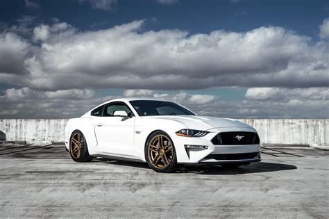 white ford mustang screams  style  blacked  mesh grille  bronze rims ford mustang