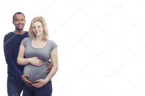 Pregnant Young Interracial Couple On White Background Banner Stock