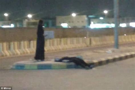 drunk saudi arabian woman lies passed out in the street in photo daily mail online