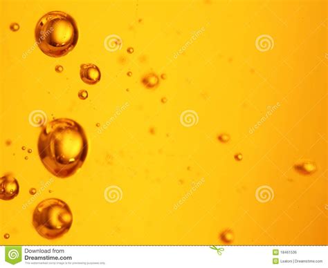 de oranje vloeistof van zeepbels stock foto image  druppeltje kleur