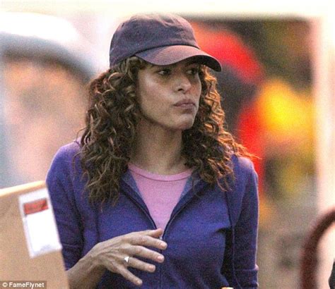 eva mendes looks unrecognisable with spiral styled locks