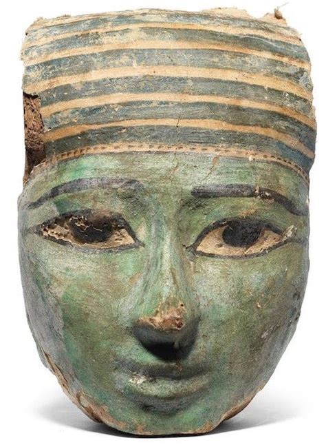An Egyptian Gesso Painted Wood Mummy Mask Late Period Circa 664 332 B