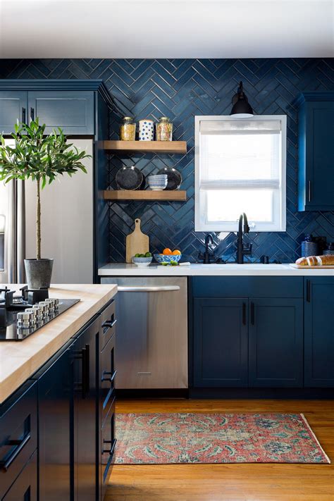 dark blue kitchen cabinets  blue tile backsplash jenn feldman
