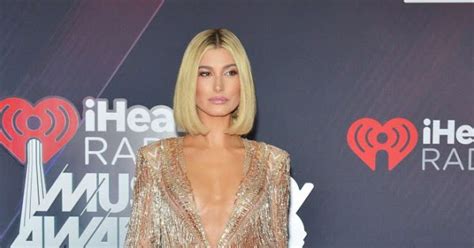 Hailey Baldwin Wears Sheer Gold Jumpsuit To The 2018