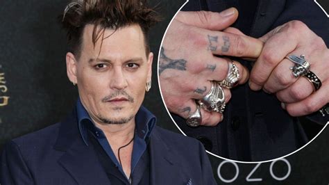 Johnny Depp Ditches Wedding Ring As Amber Heard Files For Divorce